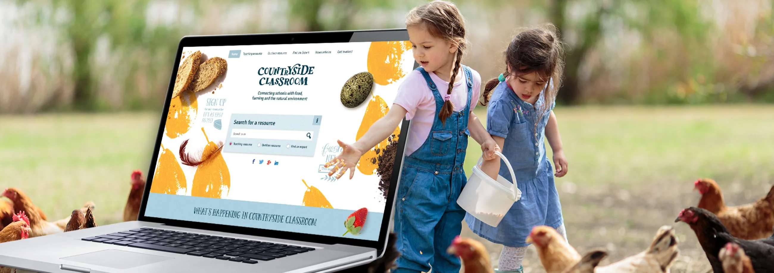 Countryside Classroom website on a laptop screen, with photo of children feeding chickens at a farm